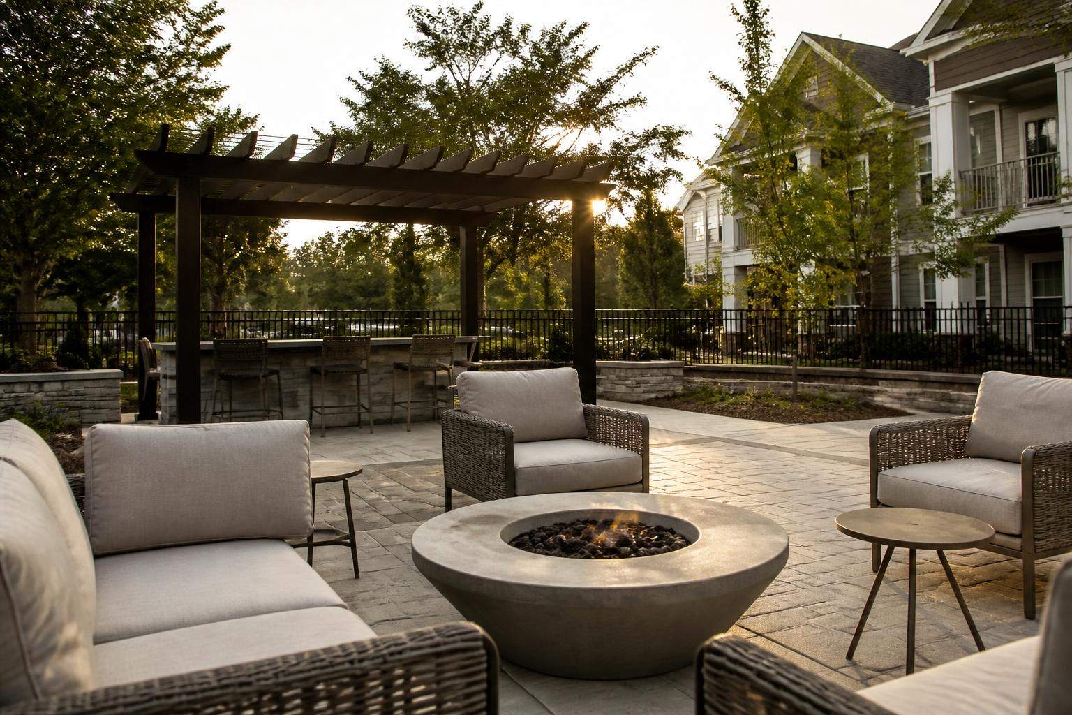 Matching neutral-colored patio furniture across a community common patio